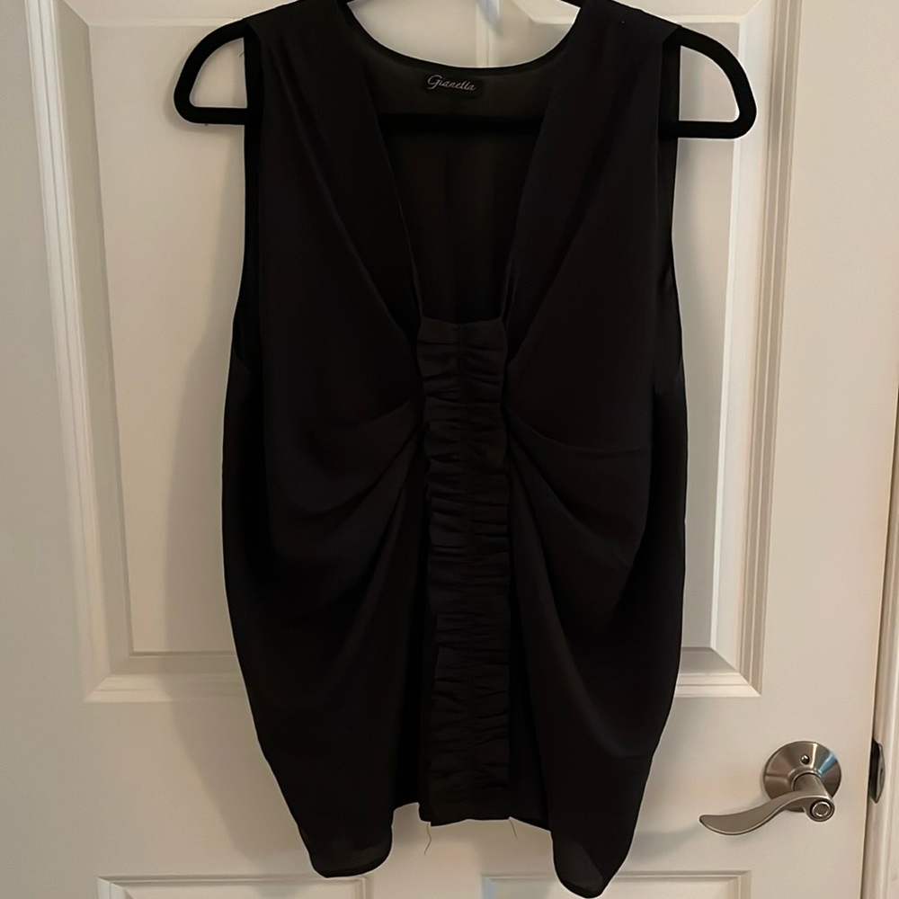 Ruffle Sleeveless Blouse